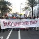 Participants in a rally by the #TakeEmDownNOLA movement march to the Robert E. Lee monument in New Orleans May 7, 2017. #TakeEmDownNOLA is a collective of activists dedicated to removing Confederate symbols throughout the city. (Andre Perry/The Root)
